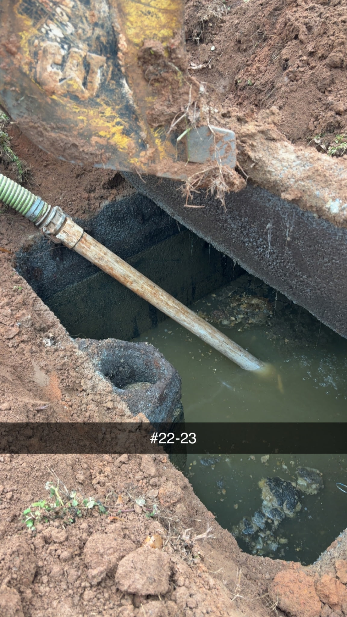 Sanders Septic LLC pumping overflowing septic tank in Loganville Georgia residential property