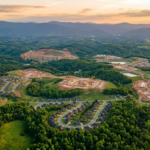 Rolling green hills and new construction homes in Northern Georgia representing the move from Illinois — Great Southern Migration guide 2026